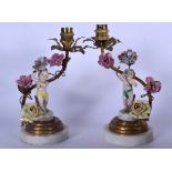 A PAIR OF GERMAN PORCELAIN FIGURAL LAMPS ON MARBLE BASES, in the form of children, with ormolu mount