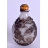 A 19TH CENTURY CHINESE MILK GLASS SNUFF BOTTLE Qing, decorated with a male and a tiger within a land