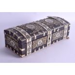A 19TH CENTURY ANGLO INDIAN CARVED IVORY AND HORN CASKET decorated with buddhistic figures and folia