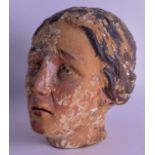 A GOOD 18TH CENTURY POLYCHROMED WOOD HEAD OF A FEMALE of good colour and patina. 23 cm x 16 cm.