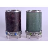A GOOD PAIR OF EARLY 20TH CENTURY CHINESE SILVER ENAMEL AND JADE BRUSH POTS decorated with bats and