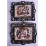 A RARE PAIR OF 19TH CENTURY VIENNESE ENAMEL FRAMED PICTURES contained within ruby, turquoise and bar