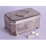 A LOVELY ANTIQUE SILVER AUTOMATON WIND UP SINGING BIRD BOX engraved with foliage and vines. 10 cm x