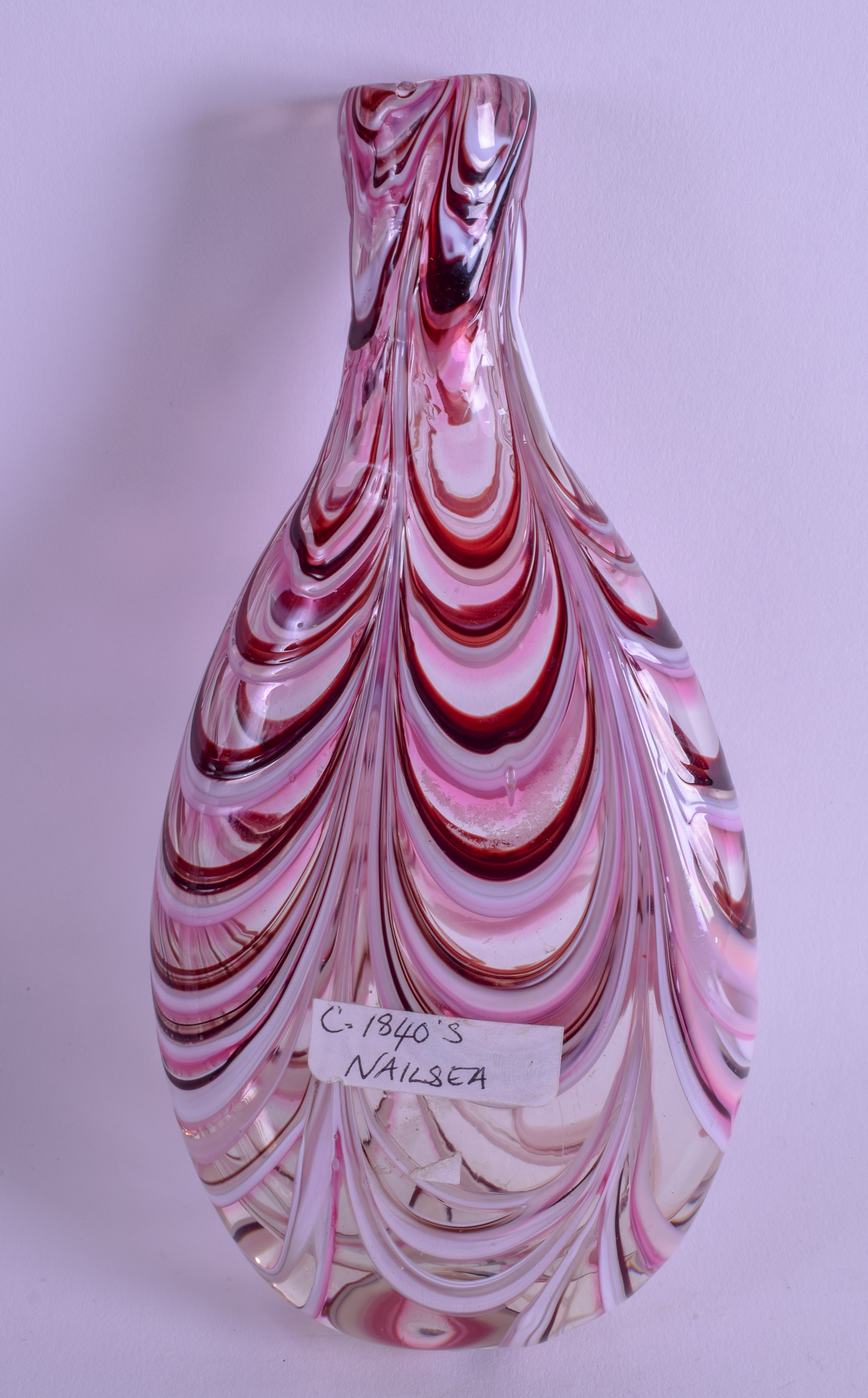 A 19TH CENTURY NAILSEA GLASS BOTTLE FLASK with drip swirl decoration. 18 cm x 7.5 cm. - Image 2 of 2