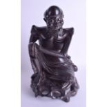 A 19TH CENTURY CHINESE HARDWOOD ZITAN FIGURE OF A BUDDHA modelled emaciated upon a open work base. 2