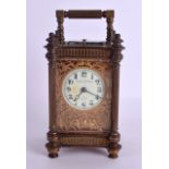 A LATE 19TH CENTURY FRENCH GILT BRONZE HOUR REPEATING CARRIAGE CLOCK the case with outset pillars, t