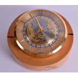 A RETRO BUHLER DESK CLOCK with globe and silvered chapter ring. 11 cm wide.