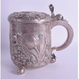 AN 18TH/19TH CENTURY CONTINENTAL SILVER STEIN inset with a coin, amongst foliage and inscriptions. 2