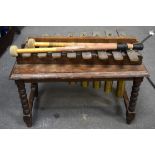 AN EARLY 20TH CENTURY XYLOPHONE, with original sticks. 40 cm wide.