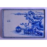 A 19TH CENTURY JAPANESE MEIJI PERIOD BLUE AND WHITE RECTANGULAR DISH painted with landscapes. 22 cm