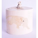 A 19TH CENTURY JAPANESE MEIJI PERIOD CARVED IVORY TUSK JAR AND COVER decorated with lions. 8 cm x 8