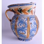 A LARGE 19TH CENTURY ITALIAN FAIENCE MAJOLICA PITCHER with inscription to the front, painted with mo