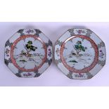 A PAIR OF 18TH CENTURY CHINESE EXPORT FAMILLE ROSE PLATES Qianlong, painted with two dogs pursuing a