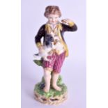 AN EARLY 19TH CENTURY DERBY FIGURE OF A FRENCH SHEPHERD modelled holding a dog & biscuit. 15 cm high