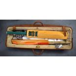 A VINTAGE CRICKET BAG, containing two bats, pads etc. (qty)