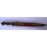 A EUROPEAN DAGGER WITH GOTHIC STYLE ETCHED BLADE, formed with a red leather sheath. 43 cm long.