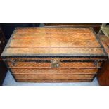 A GOOD LARGE EARLY FRENCH LOUIS VUITTON TRAVELLING TRUNK No 111943 with iron work handles and iron b