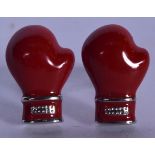 A PAIR OF BOXING CUFFLINKS IN THE FORM OF BOXING GLOVES. 2 cm long.
