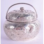 A FINE 19TH CENTURY JAPANESE MEIJI PERIOD SILVER HAND WARMER AND COVER decorated with birds and drag