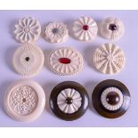A SET OF TEN EARLY 20TH CENTURY CARVED IVORY BROOCHES. (10)
