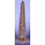 AN EGYPTIAN MARBLE OBELISK, carved with hieroglyphs on a squared base. 31 cm high.