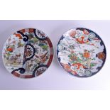A MATCHED PAIR OF 19TH CENTURY JAPANESE MEIJI PERIOD CIRCULAR DISHES painted with birds, buddhistic