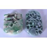 A CHINESE CARVED JADEITE PLAQUE, together with another similar. Largest 8.5 cm.