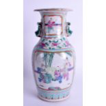 A 19TH CENTURY CHINESE CANTON FAMILLE ROSE VASE Qing, painted with figures and landscapes. 23 cm hig