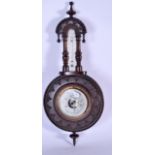 AN EARLY 20TH CENTURY CARVED MAHOGANY BAROMETER, with floral inspired detail to front. 43.5 cm long.