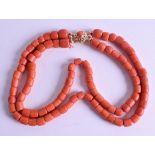 AN 18CT YELLOW GOLD CHINESE CARVED RED CORAL NECKLACE. 97 grams. Each Strand 38 cm long.