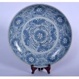A LARGE EARLY 19TH CENTURY CHINESE BLUE AND WHITE PORCELAIN DISH JIAQING, painted with stylised foli