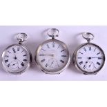 THREE ANTIQUE SILVER POCKET WATCHES. Largest 5.5 cm wide. (3)