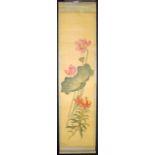 AN EARLY 20TH CENTURY CHINESE SCROLL decorated with lotus. Image 136 cm x 33 cm.