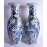 A LARGE PAIR OF 19TH CENTURY CHINESE CELADON BLUE AND WHITE VASES Qing, painted with phoenix birds w