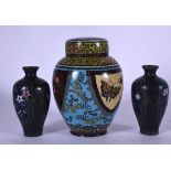 A JAPANESE MEIJI PERIOD CLOISONNE ENAMEL JAR AND COVER, together with a small pair of baluster vases