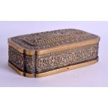 AN 18TH/19TH CENTURY MIDDLE EASTERN ISLAMIC BRASS SNUFF BOX decorated in relief with birds amongst v