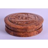 AN 18TH/19TH CENTURY CONTINENTAL CARVED BURR WALNUT SNUFF BOX decorated with figures before a fort.