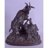 A 19TH CENTURY FRENCH CAST IRON GROUP OF A NANNY GOAT by Pierre Jules Mede (1810-1879). 23 x 24 cm