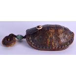 A SUPERB 18TH CENTURY JAPANESE EDO PERIOD IVORY AND TORTOISESHELL PURSE of naturalistic form, with w