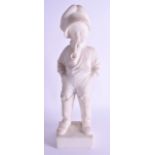 AN ART DECO EUROPEAN CARVED MARBLE FIGURE OF A STANDING BOY modelled smoking a pipe upon a square fo