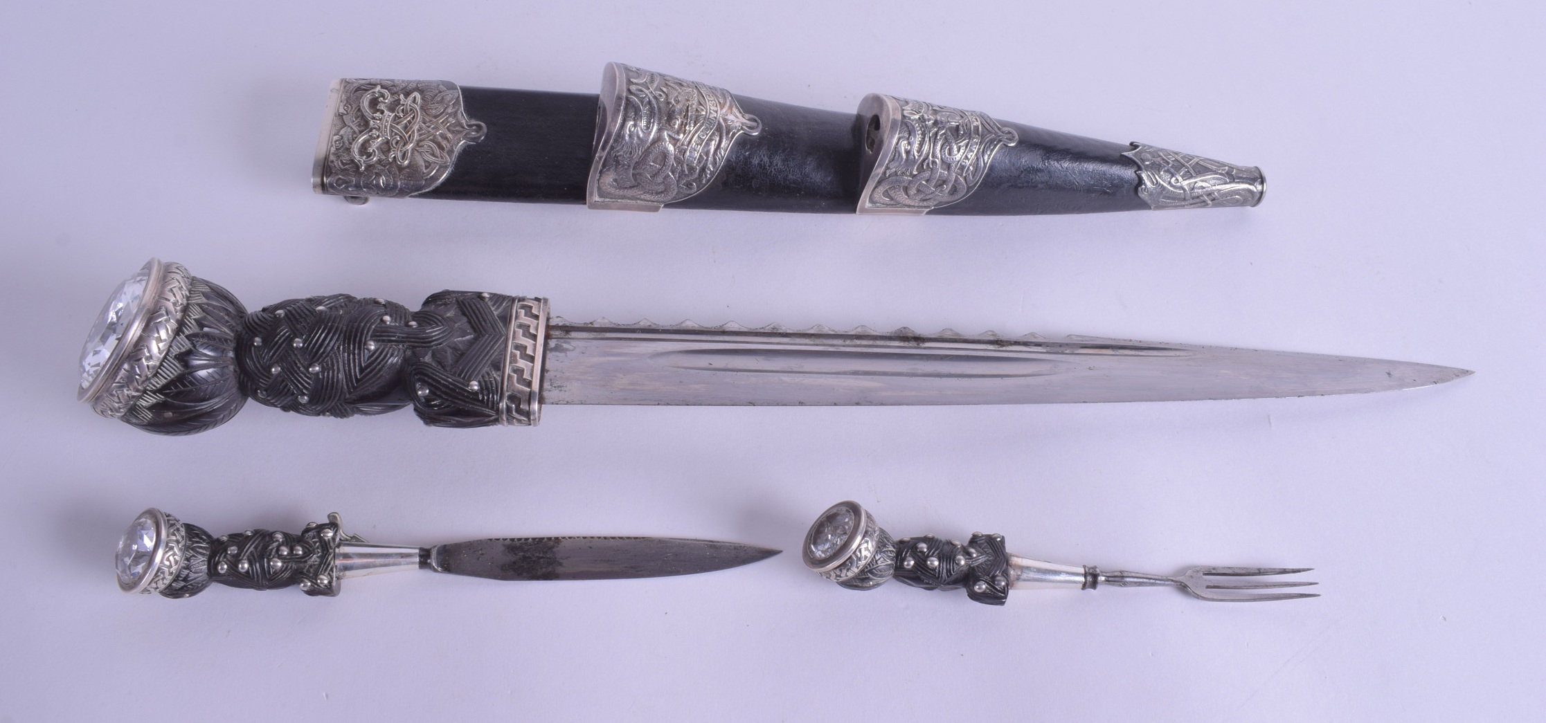 A LATE 19TH CENTURY SCOTTISH WHITE METAL ROYAL SCOTS OFFICERS DIRK DAGGER by R & HB Kirkwood of Edin