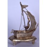 AN EARLY 20TH CENTURY INDO PERSIAN SILVER PLATED BOAT OR SHIP TABLE LAMP, formed with a pierced body