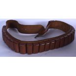 AN EARLY 20TH CENTURY LEATHER AMMUNITION BELT. 104 cm long.