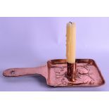 AN ARTS AND CRAFTS NEWLYN COPPER CHAMBERSTICK. 26 cm x 14 cm.