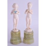 A FINE PAIR OF ART DECO CARVED NUDE IVORY FIGURES by Ferdinand Preiss (1882-1943) modelled upon onyx