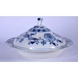 A MEISSEN ONION PATTERN BLUE AND WHITE PORCELAIN BOWL AND COVER, decorated with stylised foliage. 24