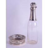 A SMALL MODERN SILVER COASTER together with a novelty silver plated champagne bottle. 24 cm high. (2