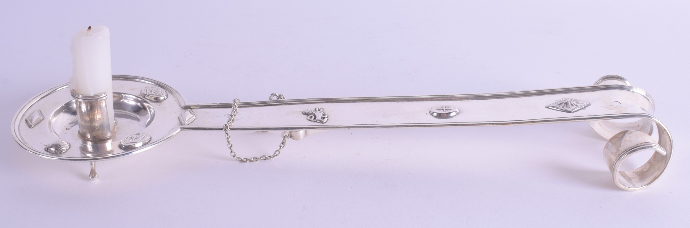 AN UNUSUAL 19TH CENTURY SPANISH SILVER CHAMBERSTICK in the 17th century style with bi facetted termi