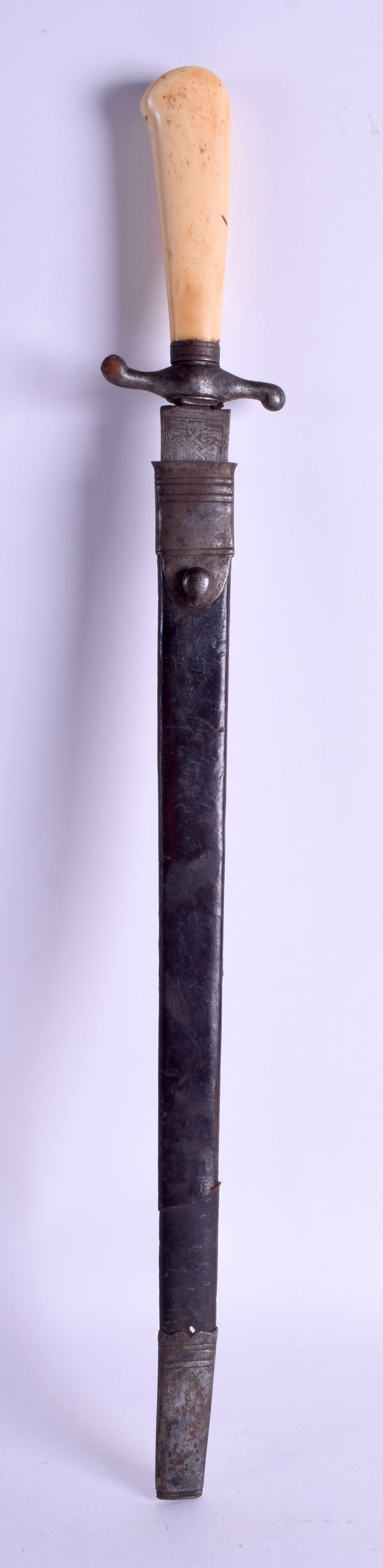 A 19TH CENTURY CARVED IVORY HANDLED STEEL KNIFE engraved with foliage and vines. 57 cm long.