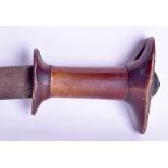 A 19TH CENTURY AFRICAN ETHIOPIAN RHINOCEROS HORN HANDLED GURADE SWORD with partial curving blade. 98